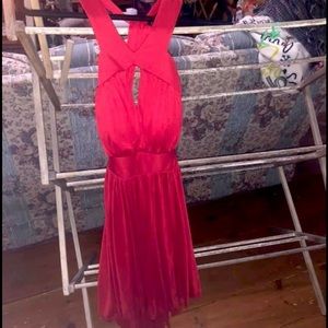Red high low dress with front key hole. Size 2